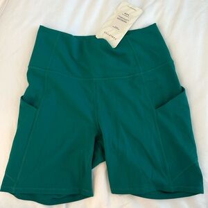 Fabletics Oasis 6” high waisted green biker shorts